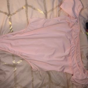 Cute light pink bodysuit